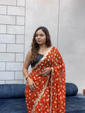 Vibrant Orange Bandhani Georgette Saree with embroidery Lace Border & Running Blouse