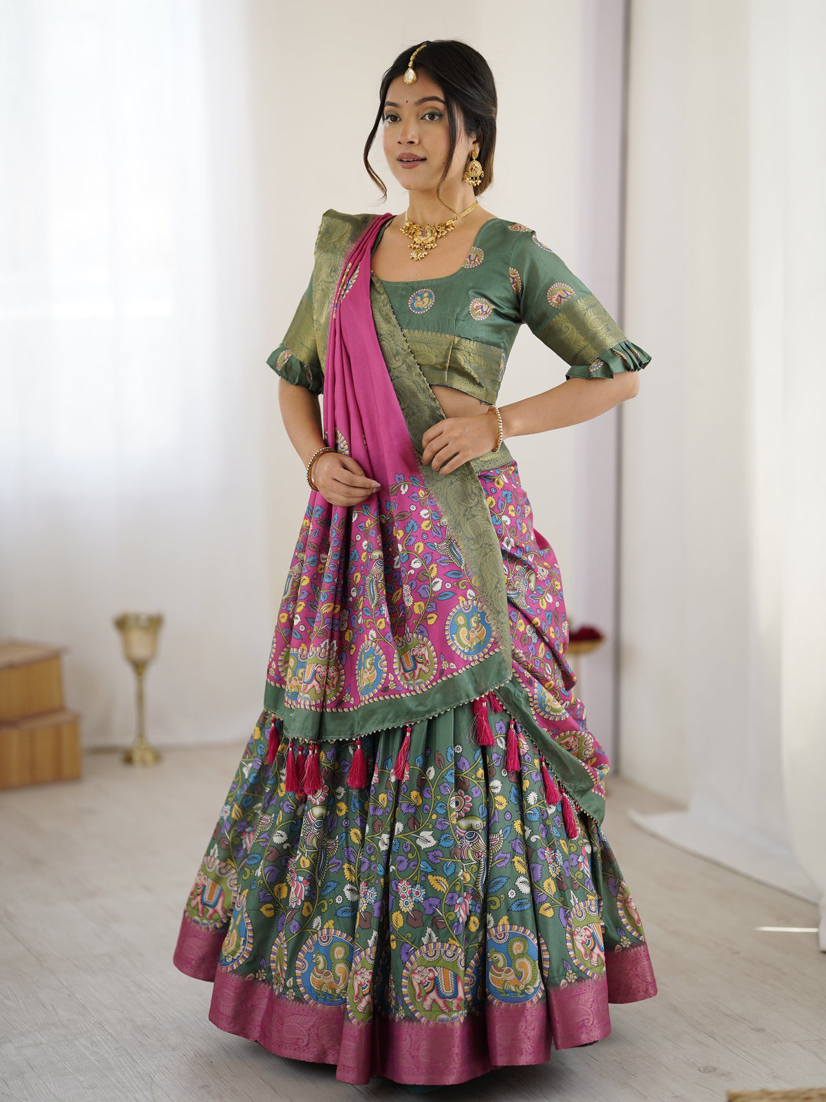 Green & Pink Kalamkari Tussar Silk Lehenga with Zari Border & Tassel Dupatta – Festive & Wedding Wear